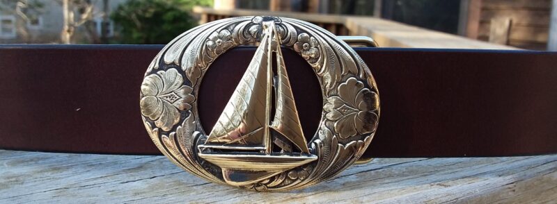 Cape Leather Sailboat Belt in 1-1/2" on etched oval solid brass