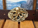 Octopus on Filigree Oval Background in Solid Brass