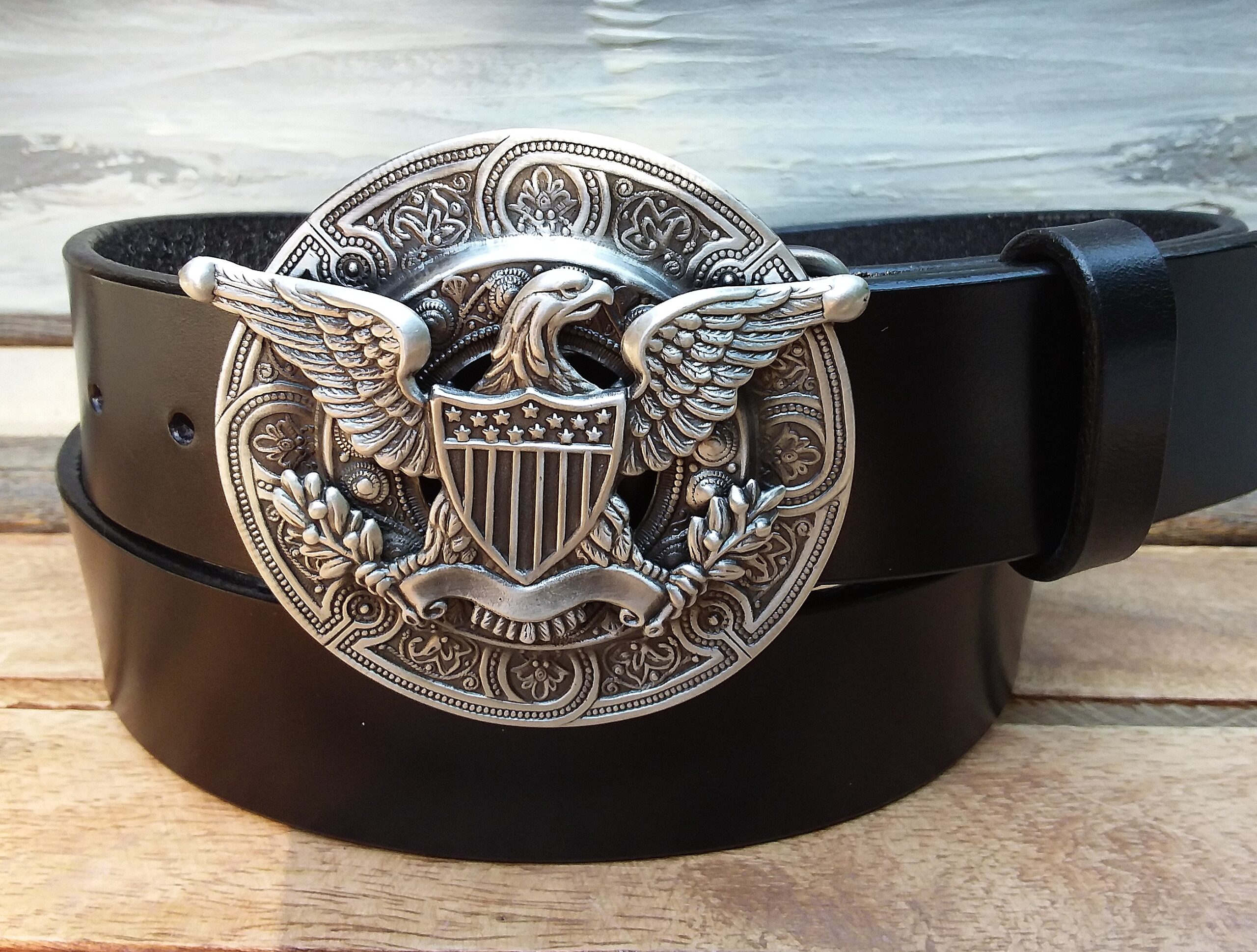 Leather belt with eagle plate